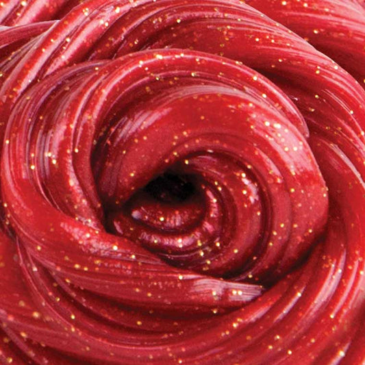 Close up detail of red putty with gold glitter.